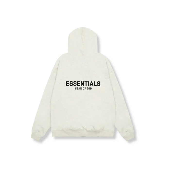 "Essentials oversized unisex hoodie in beige, grijs of zwart met ruime capuchon, buidelzak en minimalistisch ontwerp."