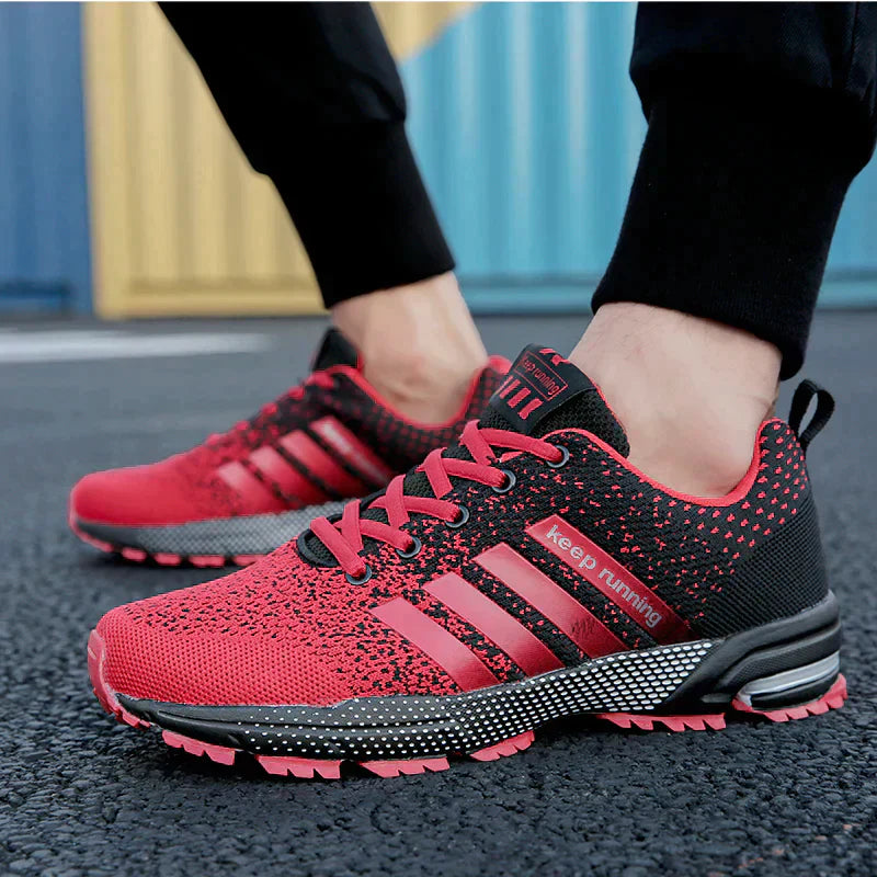 "Ademende herensneakers met reflecterende details, ideaal voor hardlopen. Mesh bovenwerk en stevige demping voor comfort."