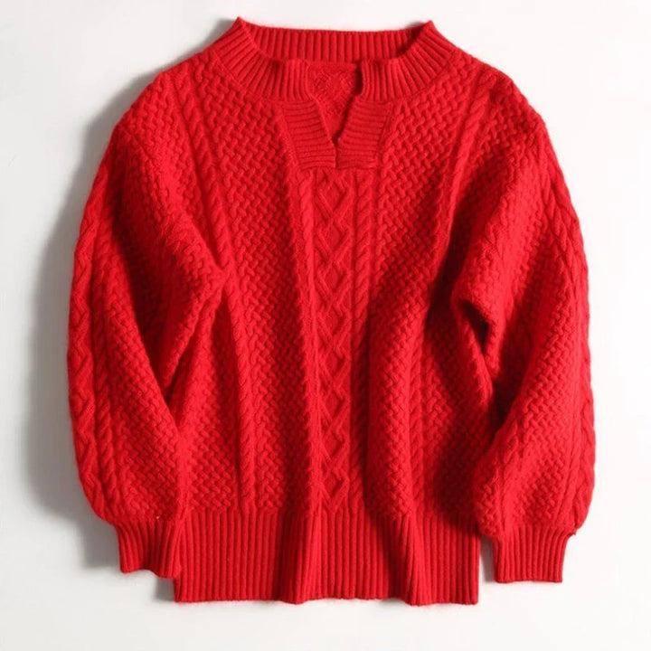 "Ademende wollen trui met uniek kabelpatroon, stijlvolle winterkleding voor dames, verkrijgbaar in diverse kleuren."