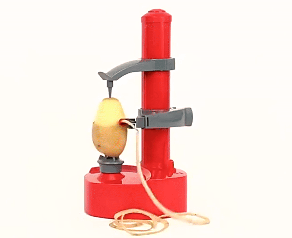 "Automatische schiller in gebruik, schilt efficiënt appels en aardappels in keuken. Tijdbesparend en veilig gebruik."