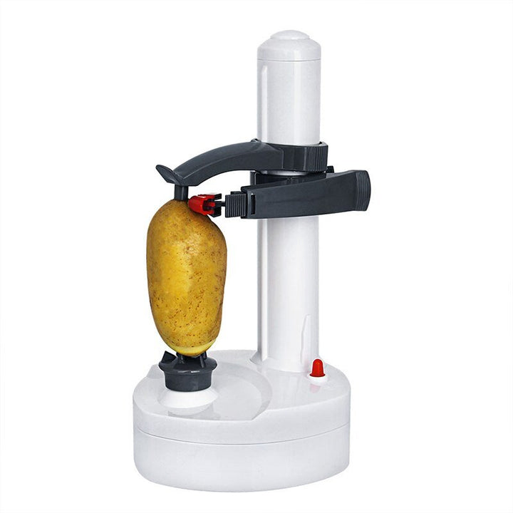 "Automatische schiller in gebruik, schilt efficiënt appels en aardappels in keuken. Tijdbesparend en veilig gebruik."