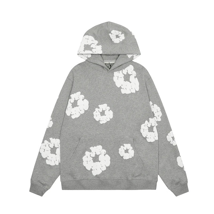 "Blauwe denim hoodie met bloemenprint en capuchon, trendy en comfortabel voor heren in de winter."