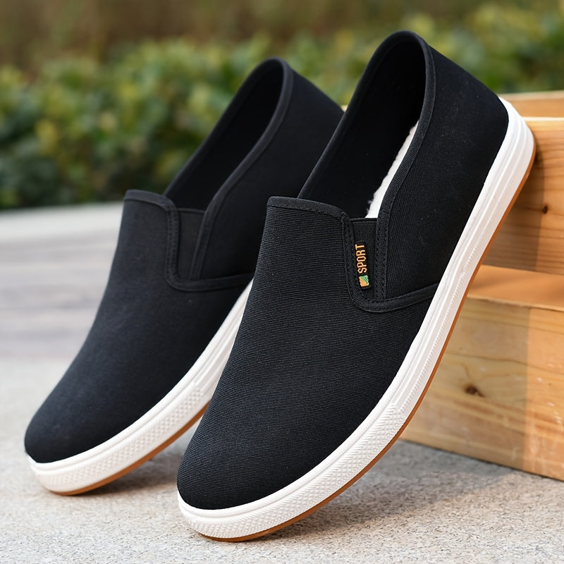 "Blauwe heren sneakers slip-on loafers met elastische zijbanden en antislipzool, perfect voor casual en zomers gebruik."