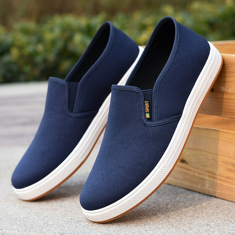 "Blauwe heren sneakers slip-on loafers met elastische zijbanden en antislipzool, perfect voor casual en zomers gebruik."
