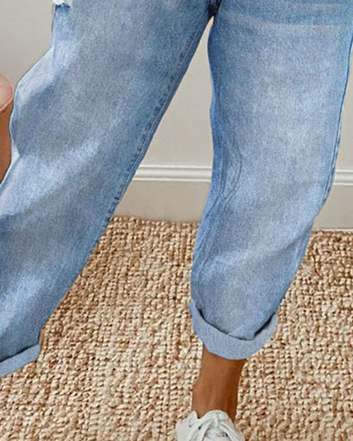 "Blauwe jeans dames met zakken en medium taille, casual stijl voor dagelijks comfort."