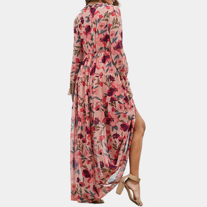 "Boho maxi-jurk met kleurrijke bloemenprint en diepe V-hals, ideaal voor zomerse stijl en elegantie"