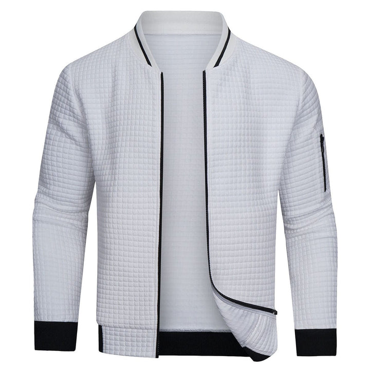 "Casual minimalistische herenjas, wit, monochroom rasterpatroon, stijlvol en warm, ideaal voor dagelijks gebruik."