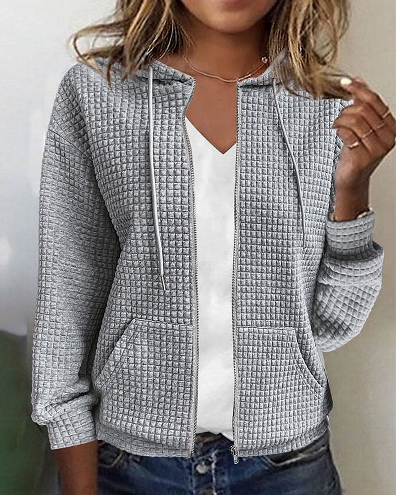 "Comfortabel damesvest met zakken, casual stijl, tijdloos design, praktische ritssluiting, ademende stof, grijs met capuchon.