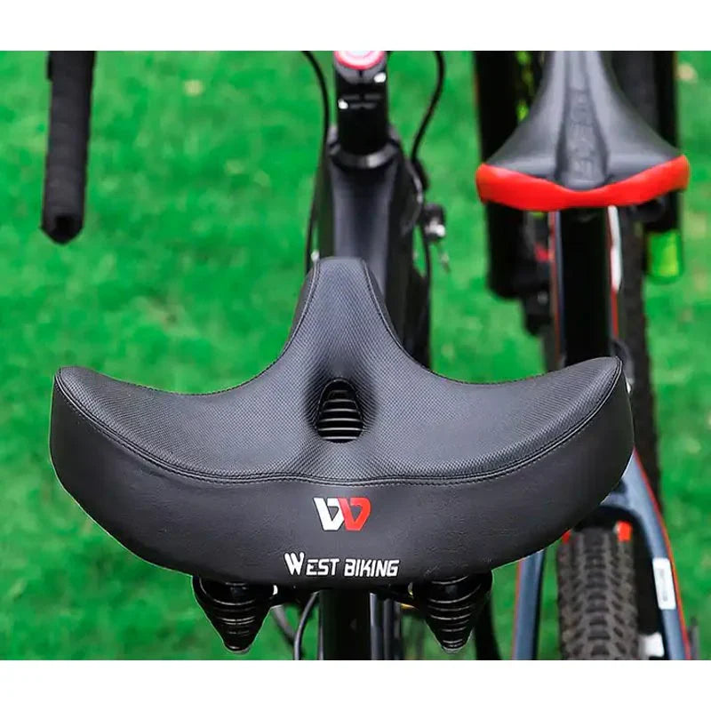 "Comfortabel fietszadel met extra brede zitting, ergonomisch design, ademende bekleding, schokabsorberend schuim."