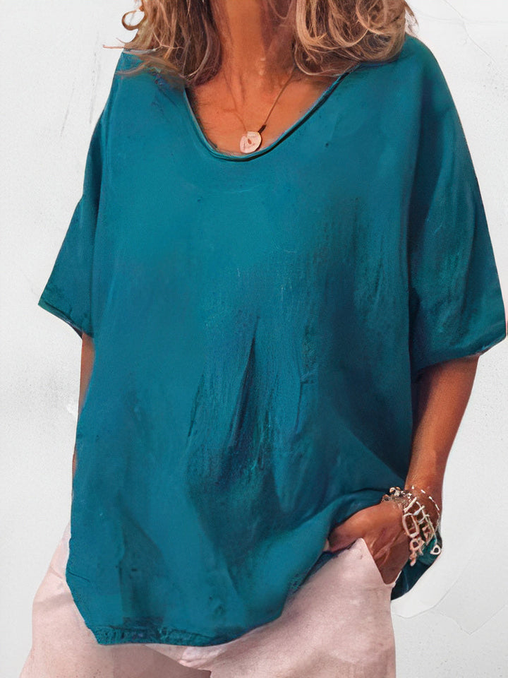 "Comfortabel oversized linnen T-shirt voor dames, ademend en chique, perfect voor casual en warme dagen, veelzijdig ontwerp."