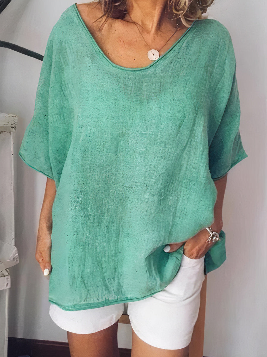 "Comfortabel oversized linnen T-shirt voor dames, ademend en chique, perfect voor casual en warme dagen, veelzijdig ontwerp."