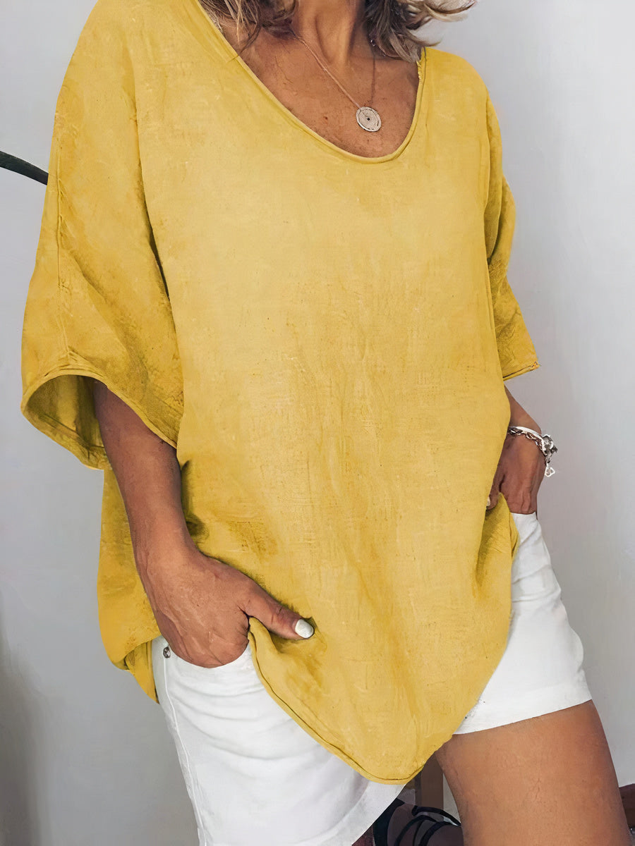 "Comfortabel oversized linnen T-shirt voor dames, ademend en chique, perfect voor casual en warme dagen, veelzijdig ontwerp."