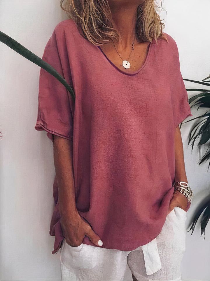 "Comfortabel oversized linnen T-shirt voor dames, ademend en chique, perfect voor casual en warme dagen, veelzijdig ontwerp."