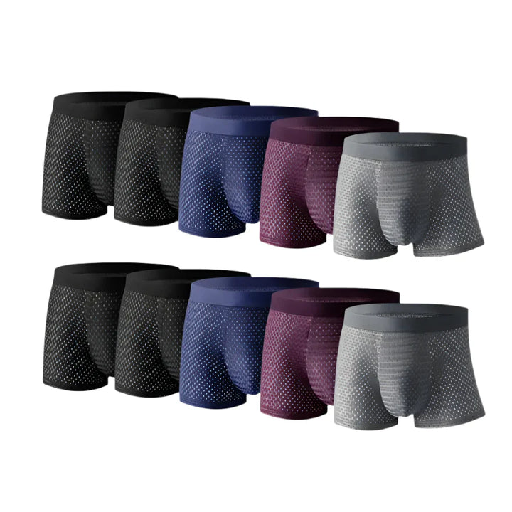 "Comfortabele BambooLux boxershorts van bamboe viscose en biologisch katoen, in zwart, grijs en marineblauw."