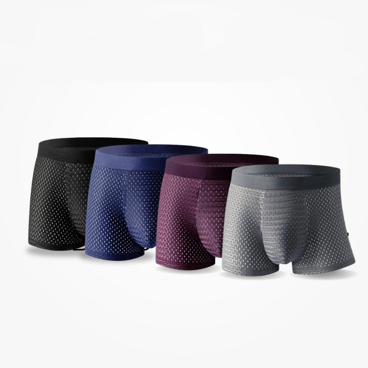 "Comfortabele BambooLux boxershorts van bamboe viscose en biologisch katoen, in zwart, grijs en marineblauw."