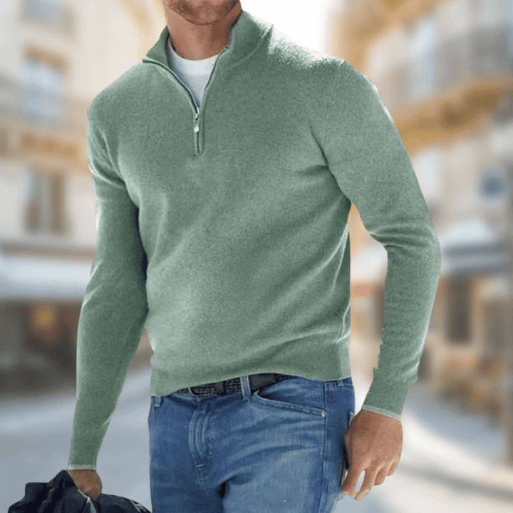"Comfortabele half-zip herentrui in zachte wolmix met moderne stijl en ribboorden, ideaal voor casual en smart-casual looks."