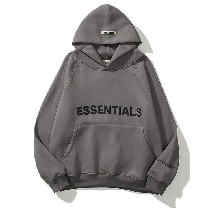 "Comfortabele oversized Essentials Hoodie met ruime capuchon en buidelzak voor dames, ideaal voor streetwear-look."