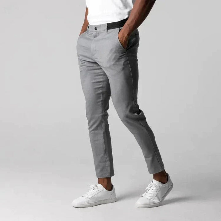 "Comfortabele stretch chino voor heren, slanke pasvorm, enkelhoogte, ademende stof, geschikt voor formele en informele gelege