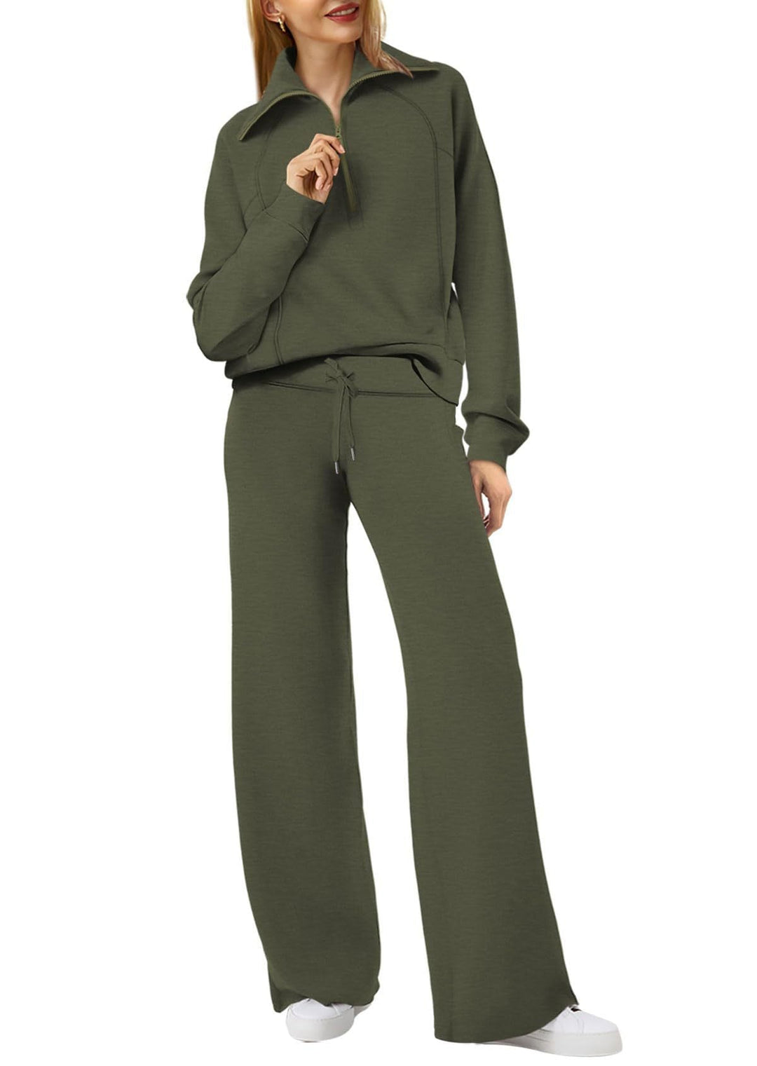 Comfortabele tweedelige damesoutfit met lange mouwen, ritssluiting en diverse kleuren. Ideaal voor dagelijks comfort.