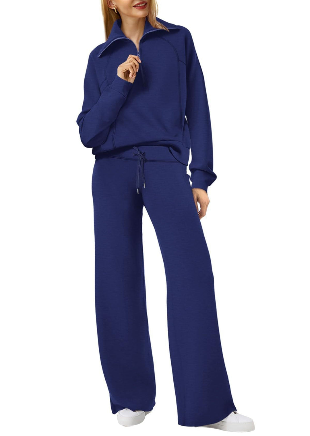 Comfortabele tweedelige damesoutfit met lange mouwen, ritssluiting en diverse kleuren. Ideaal voor dagelijks comfort.