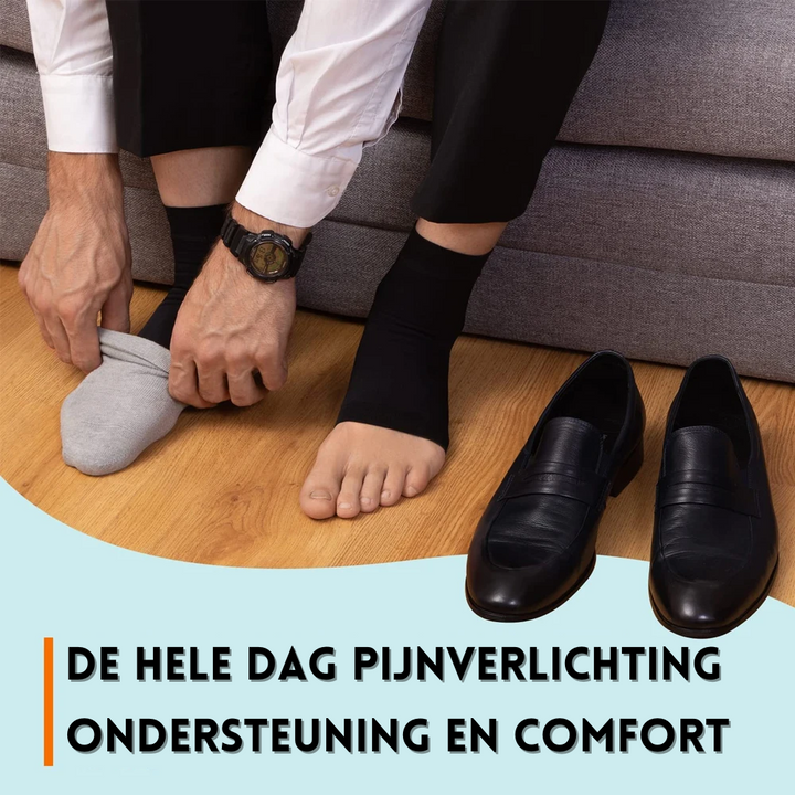 "Comfortabele unisex compressiekous, zwart, enkelhoogte, voor pijnverlichting en steun bij neuropathie en fasciitis."