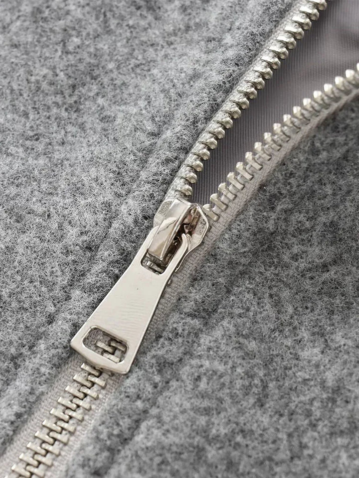 "Dames grijze bomberjas met ritssluiting, elastische tailleband en moderne oversized fit voor een stijlvolle casual look."