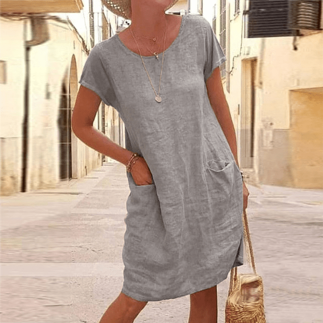 Dames linnen midi zomerjurk, korte mouwen, zakken, lichtbeige, elegante stijl, functioneel ontwerp, geschikt voor warme dagen