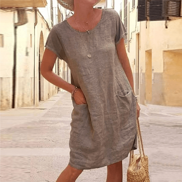 Dames linnen midi zomerjurk, korte mouwen, zakken, lichtbeige, elegante stijl, functioneel ontwerp, geschikt voor warme dagen
