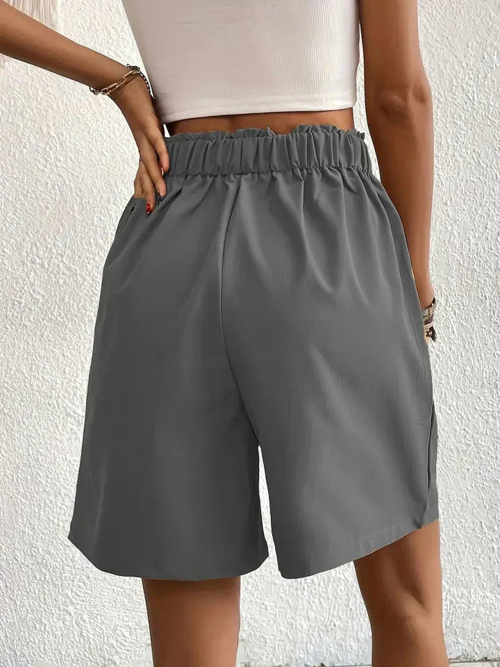 "Dames linnen zomershorts met hoge taille, schuine zakken, lichtgewicht, ademend, perfect voor zomerse dagen."