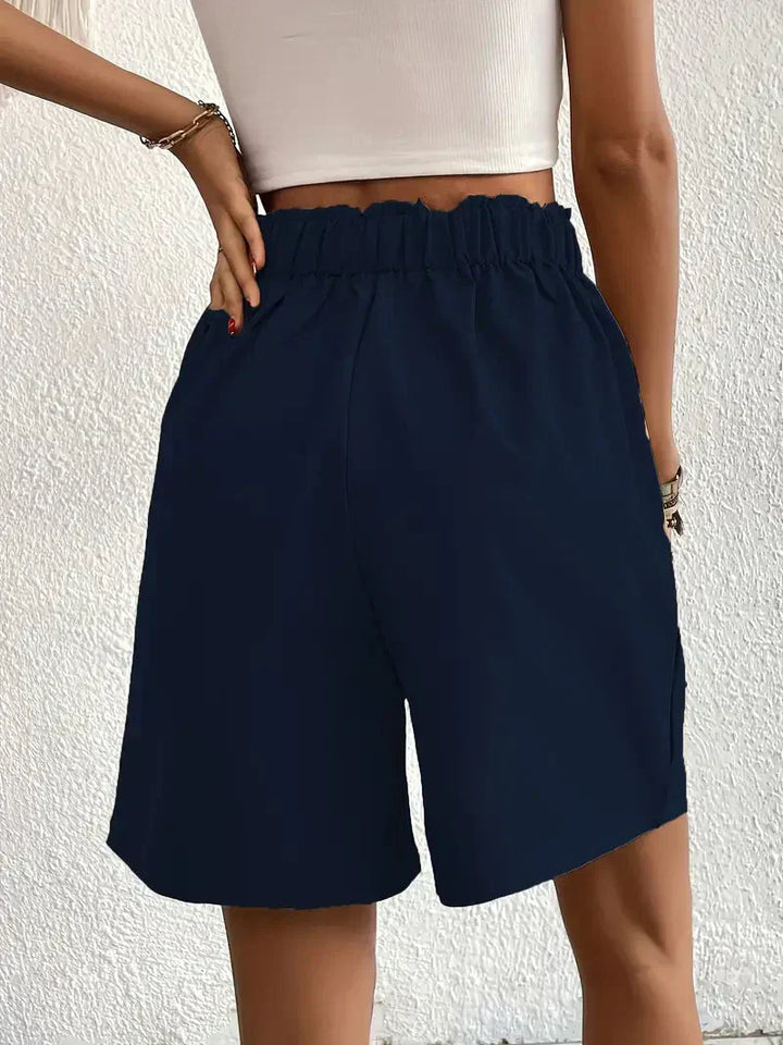 "Dames linnen zomershorts met hoge taille, schuine zakken, lichtgewicht, ademend, perfect voor zomerse dagen."