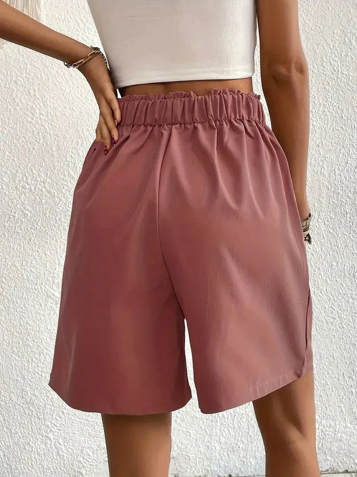 "Dames linnen zomershorts met hoge taille, schuine zakken, lichtgewicht, ademend, perfect voor zomerse dagen."