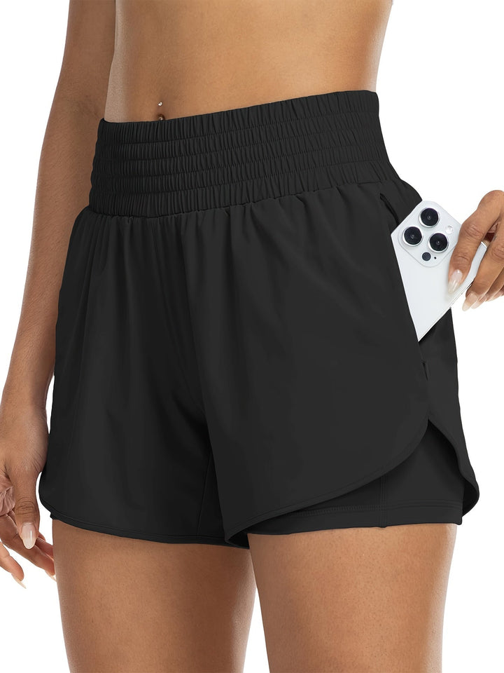 "Dames trainingsshorts met hoge taille, 2-in-1 ontwerp, losse buitenlaag en elastische binnenlaag, ademende stof."