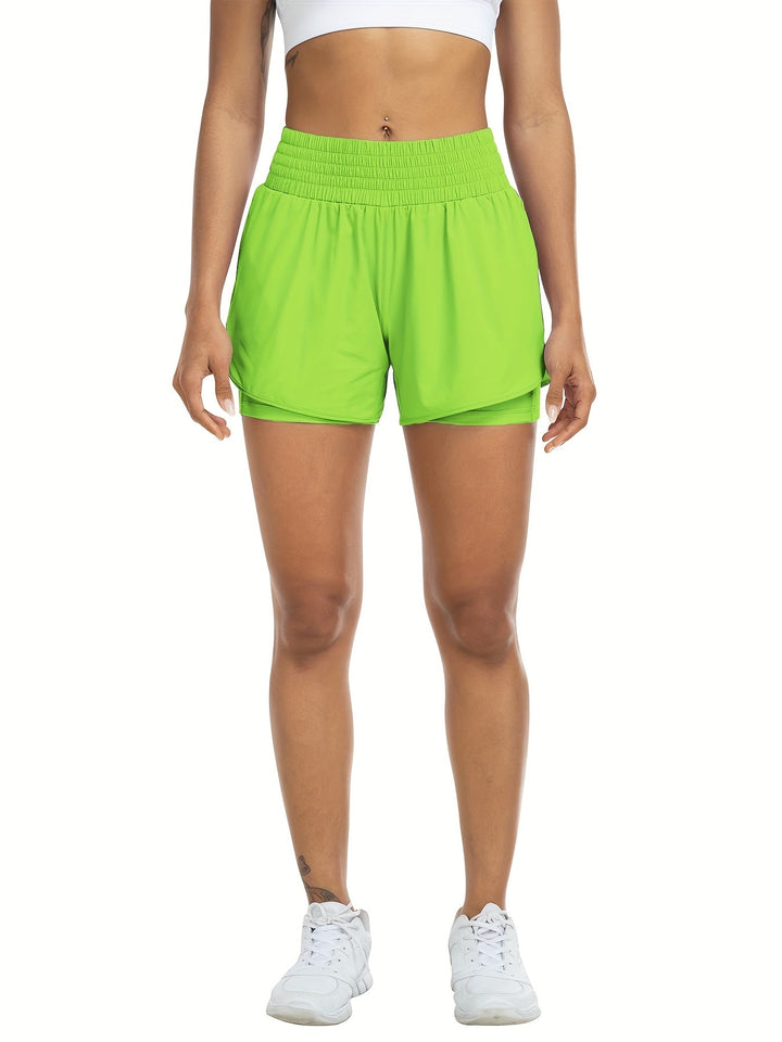 "Dames trainingsshorts met hoge taille, 2-in-1 ontwerp, losse buitenlaag en elastische binnenlaag, ademende stof."