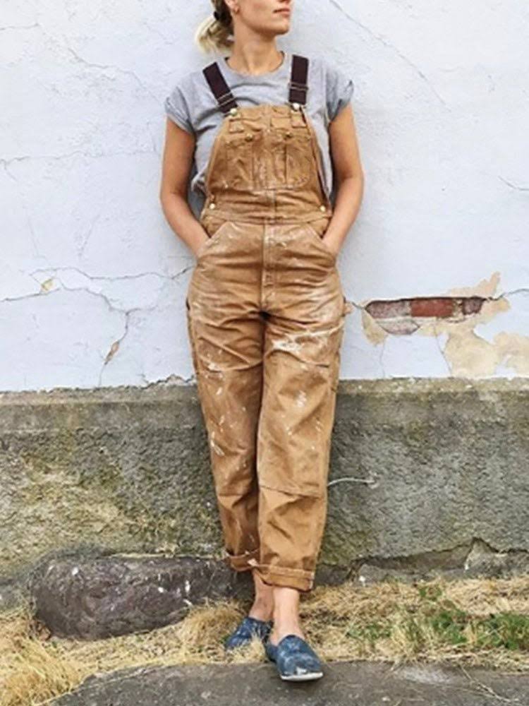 "Dames tuinbroek met verstelbare bretels, retro stijl, navy kleur, voorzijde met zakken, duurzaam en tijdloos ontwerp."