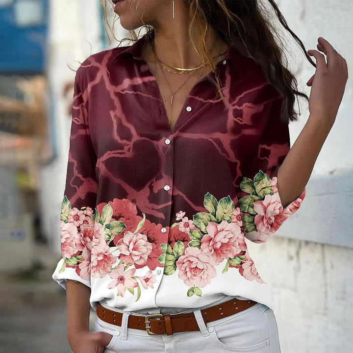 "Dames zomerbloes met lange mouwen, bloemenprint, zachte stof. Perfect voor zomerdagen; vrouwelijk en stijlvol ontwerp."