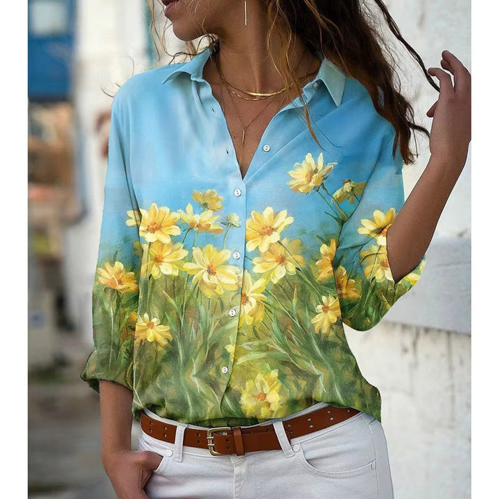 "Dames zomerbloes met lange mouwen, bloemenprint, zachte stof. Perfect voor zomerdagen; vrouwelijk en stijlvol ontwerp."