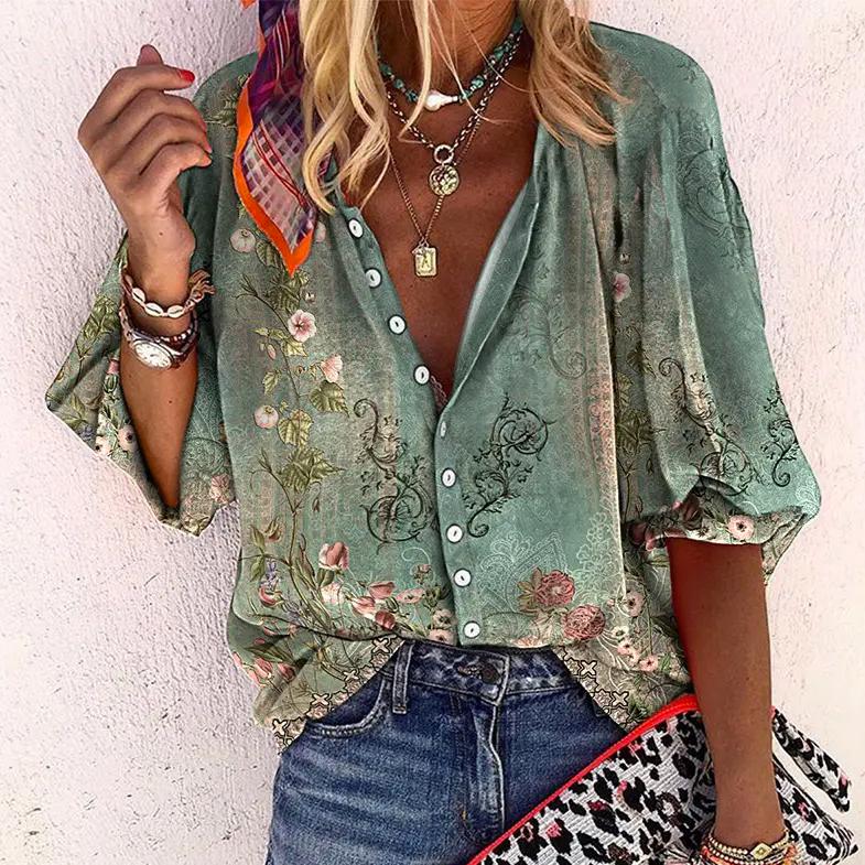 "Dames zomerblouse met geprinte print, lichtgewicht stof, knoopsluiting en halflange mouwen voor elegante zomerstijl."