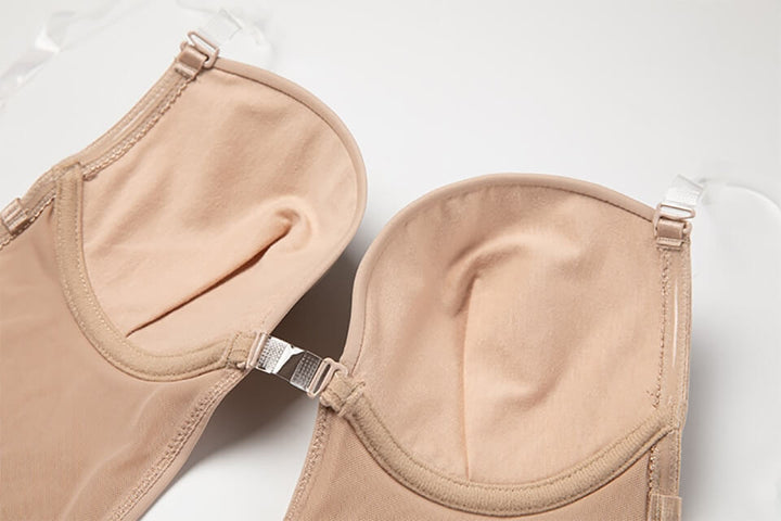 "Diepe V rugloze body shaper voor dames, naadloos en comfortabel, onzichtbaar onder kleding, open rug ontwerp, beige kleur."