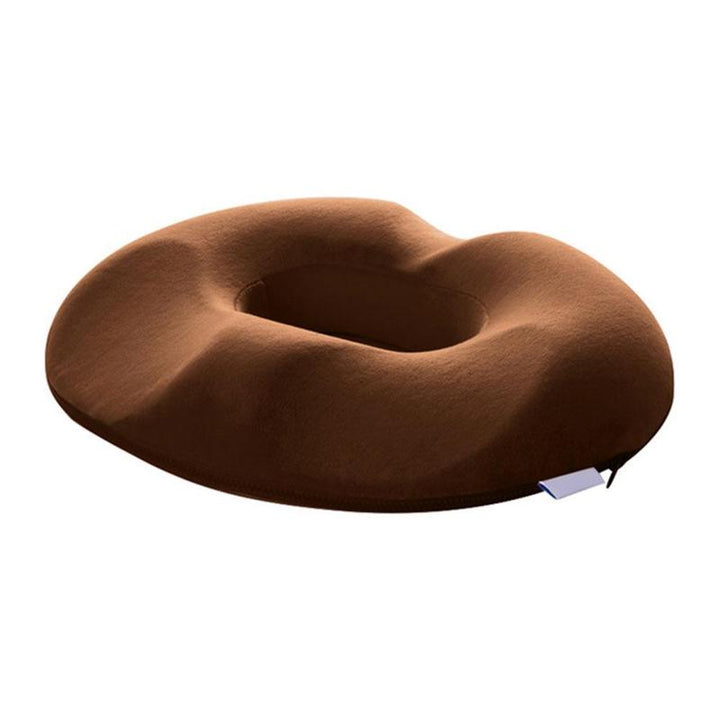 "Donutvormig stuitkussen voor aambeien, ergonomisch ontwerp, strategische openingen voor drukverlichting en maximaal comfort.