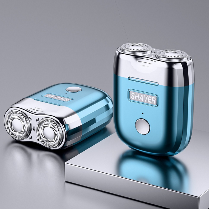 "Draagbaar mini scheerapparaat, compact ontwerp, zilver, ergonomisch, oplaadbaar, geschikt voor gevoelige huid."