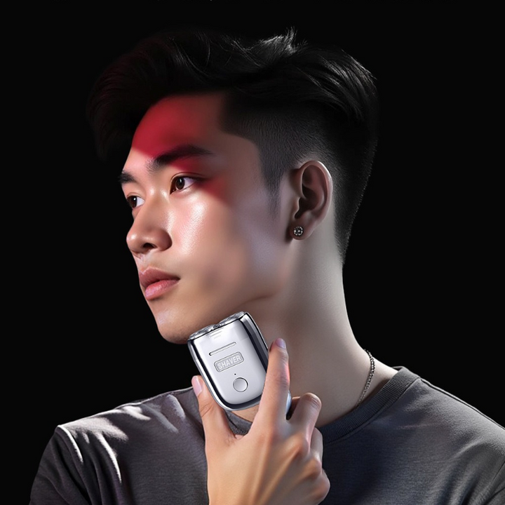 "Draagbaar mini scheerapparaat, compact ontwerp, zilver, ergonomisch, oplaadbaar, geschikt voor gevoelige huid."