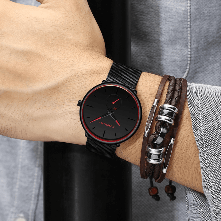 "Dun minimalistisch herenhorloge met elegante zwarte wijzerplaat, roestvrijstalen mesh-band en luxe uitstraling."