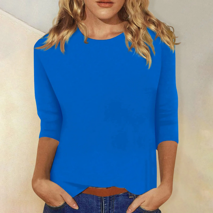 "Effen damesshirt met ronde hals en lange mouwen, stijlvolle en comfortabele pasvorm, ideaal voor iedere gelegenheid."