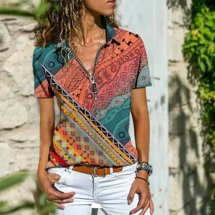 Elegant dames zomershirt in paars, luchtige stof, subtiele pofmouwen, moderne pasvorm, perfecte zomerlook.