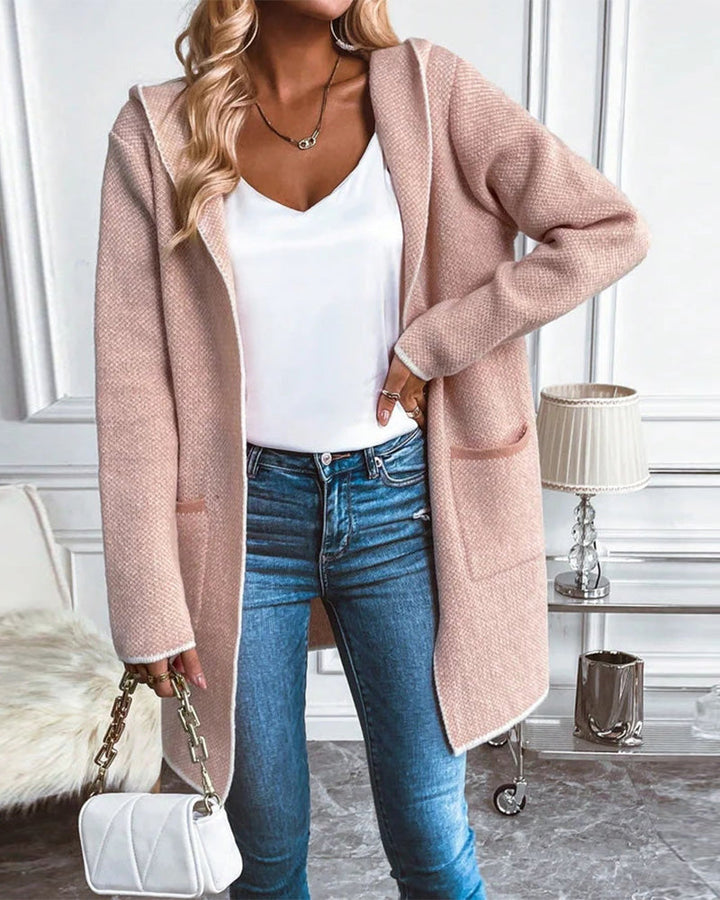 Elegant halflang vest voor dames, chique ontwerp, zachte gebreide stof, met ruime zakken voor dagelijks gebruik.
