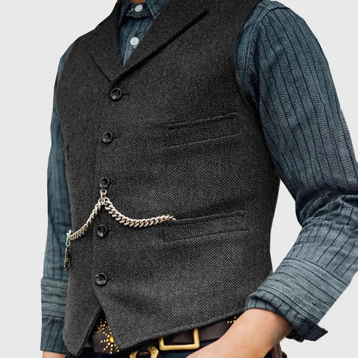"Elegant heren gilet met klassiek visgraatpatroon en verfijnde knoopsluiting, perfect voor zowel zakelijke als casual gelegen