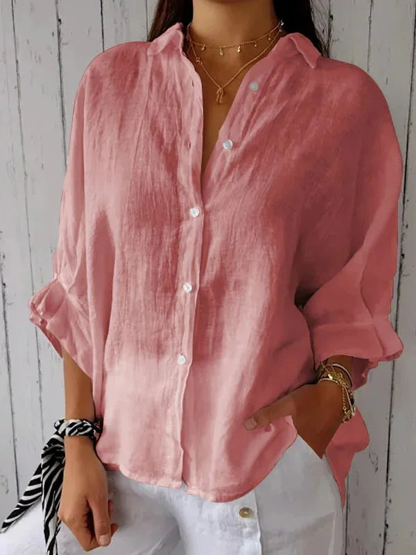 "Elegant linnen damesblouse met V-hals en strikdetail in neutrale kleuren, perfect voor elke gelegenheid."