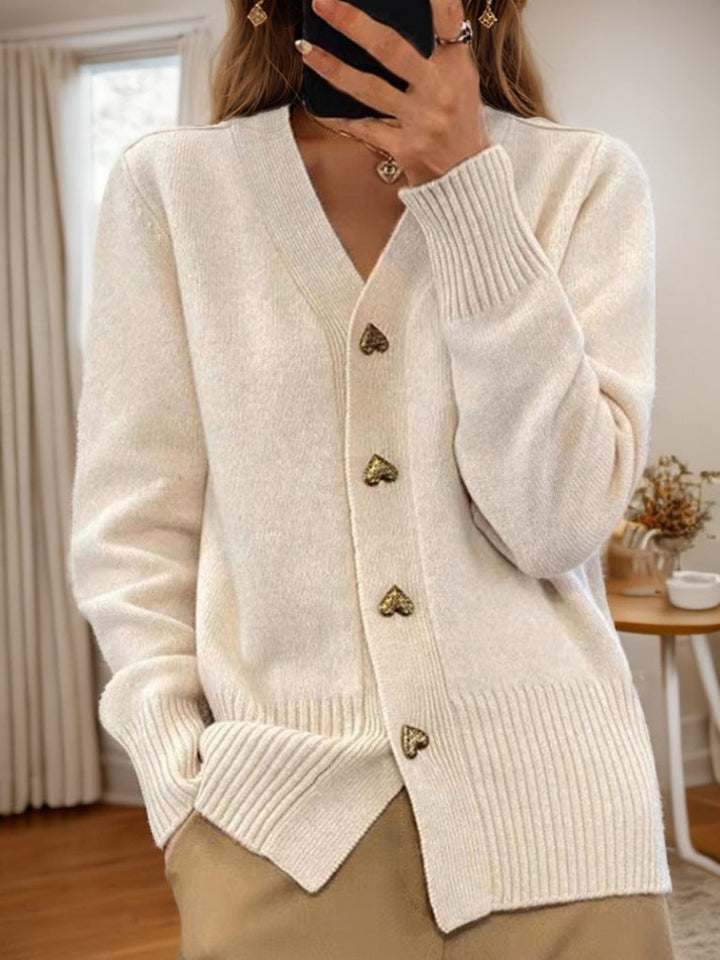 "Elegant mouwloos beige gebreid vest voor dames, zacht knit, ademend, met handige zakken voor stijl in elk seizoen."