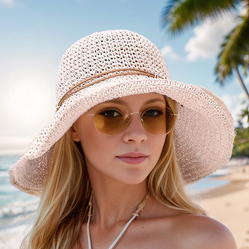 "Elegant opvouwbare zonnehoed voor dames met brede rand, beige tint, biedt UV-bescherming en stijl voor zomerse dagen."
