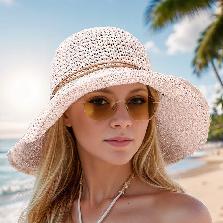 "Elegant opvouwbare zonnehoed voor dames met brede rand, beige tint, biedt UV-bescherming en stijl voor zomerse dagen."